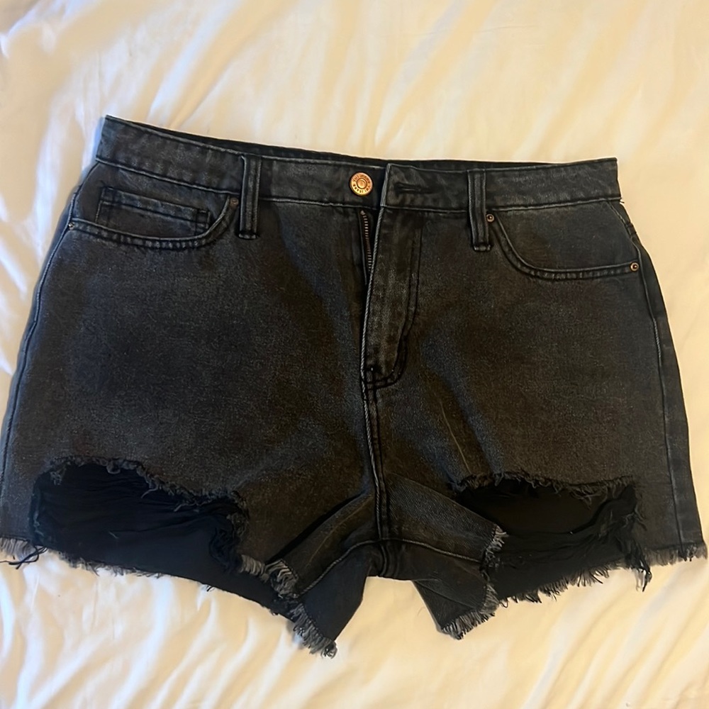 Black distressed shorts